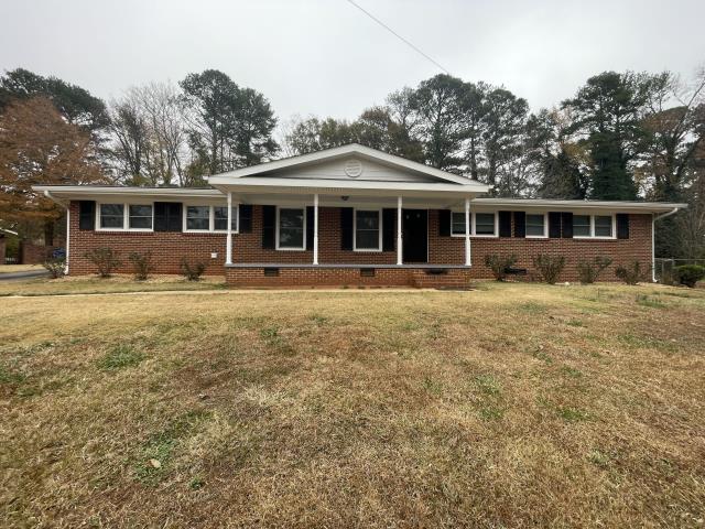 We replaced the roof, gutters, siding and windows on a house in East Point, Ga. 