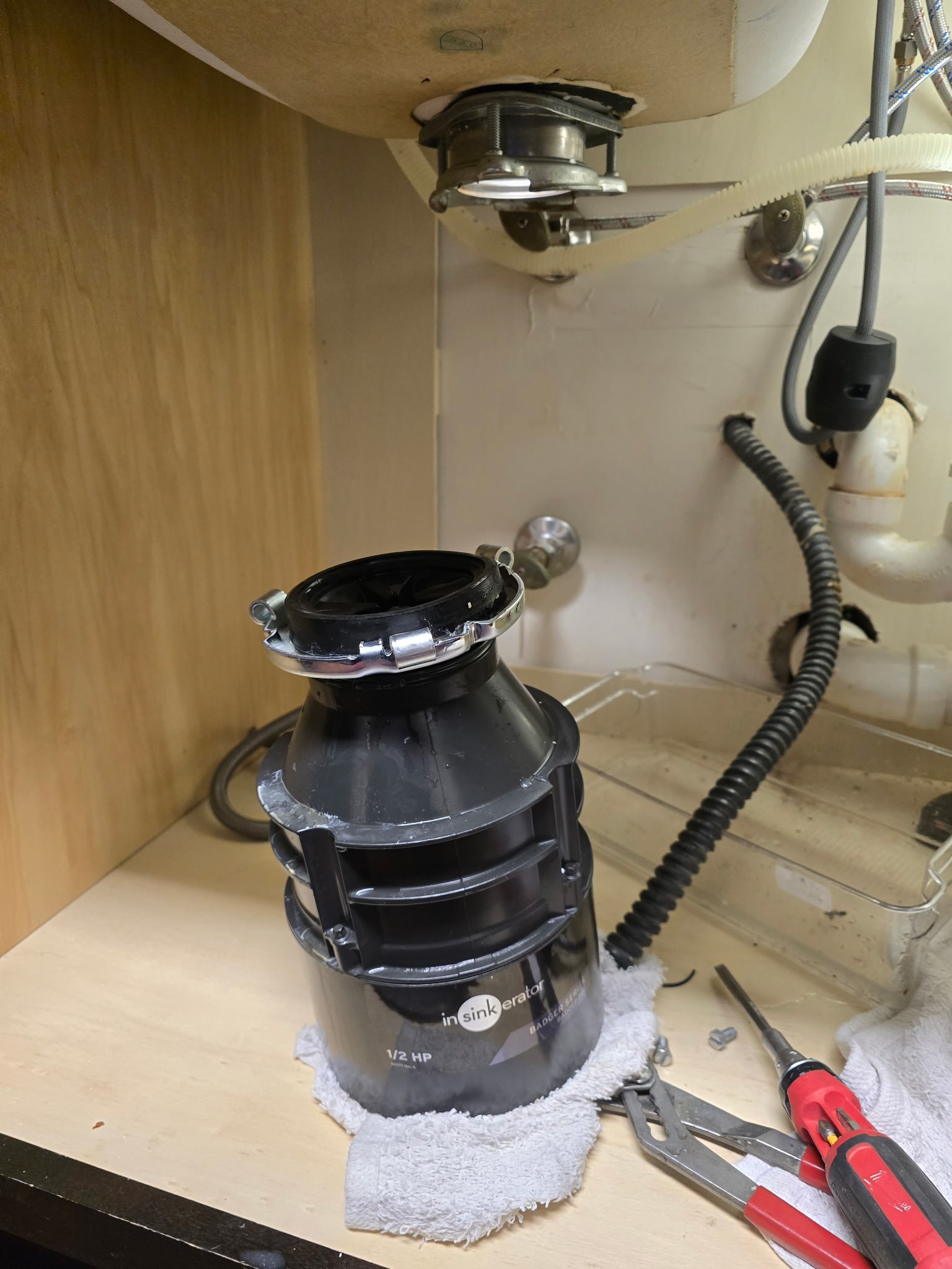 I began by carefully removing the old kitchen faucet, ensuring all components were safely set aside. Next, I installed the new faucet provided by the customer, making sure all connections were secure and precise. Following this, I reinstalled the existing garbage disposal, ensuring it was properly aligned and connected to the plumbing. After turning the water back on, I thoroughly tested for any leaks and confirmed that the faucet and disposal were operating correctly. The job was completed efficiently, with all systems functioning as expected.
