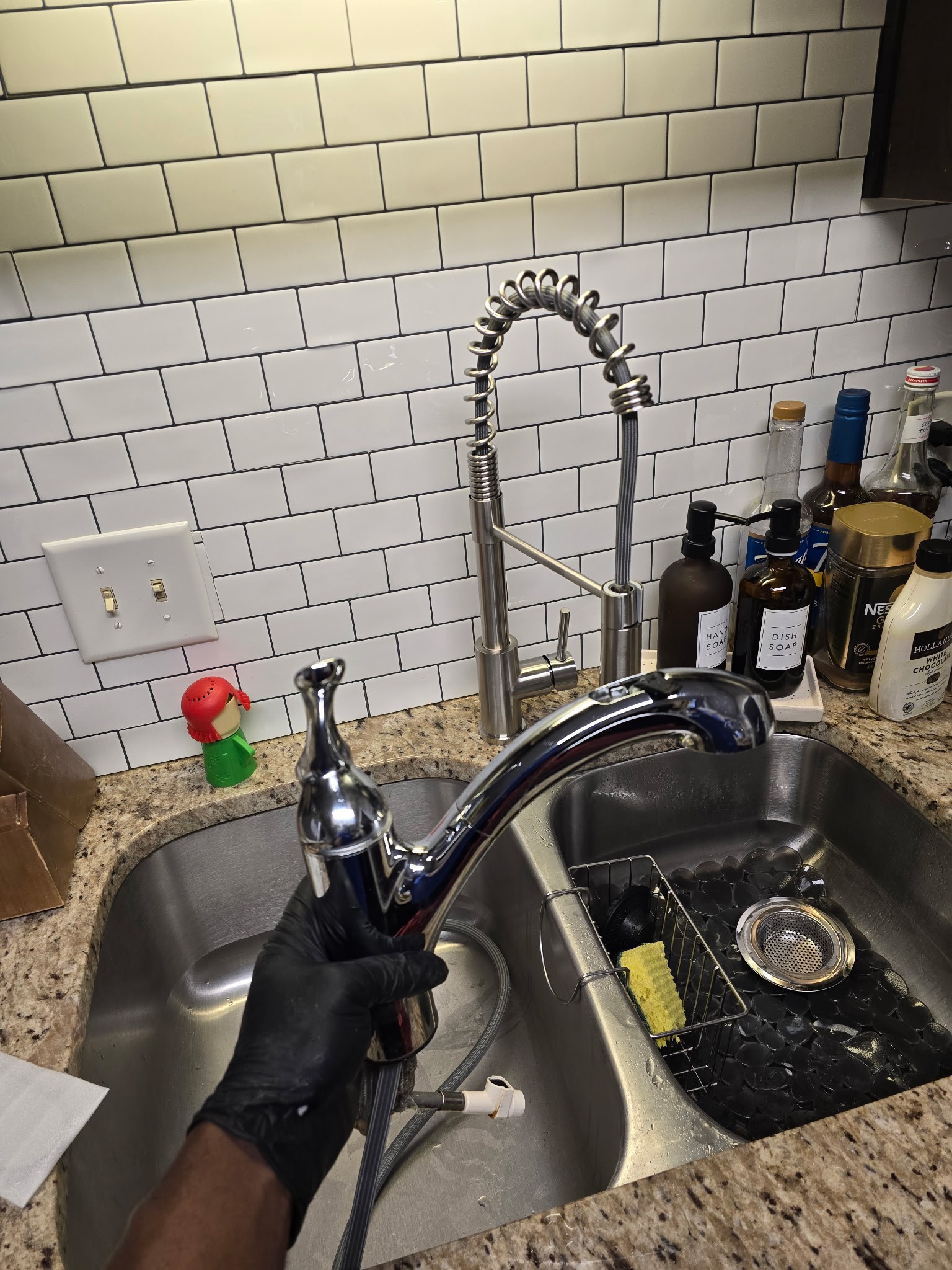 I began by carefully removing the old kitchen faucet, ensuring all components were safely set aside. Next, I installed the new faucet provided by the customer, making sure all connections were secure and precise. Following this, I reinstalled the existing garbage disposal, ensuring it was properly aligned and connected to the plumbing. After turning the water back on, I thoroughly tested for any leaks and confirmed that the faucet and disposal were operating correctly. The job was completed efficiently, with all systems functioning as expected.