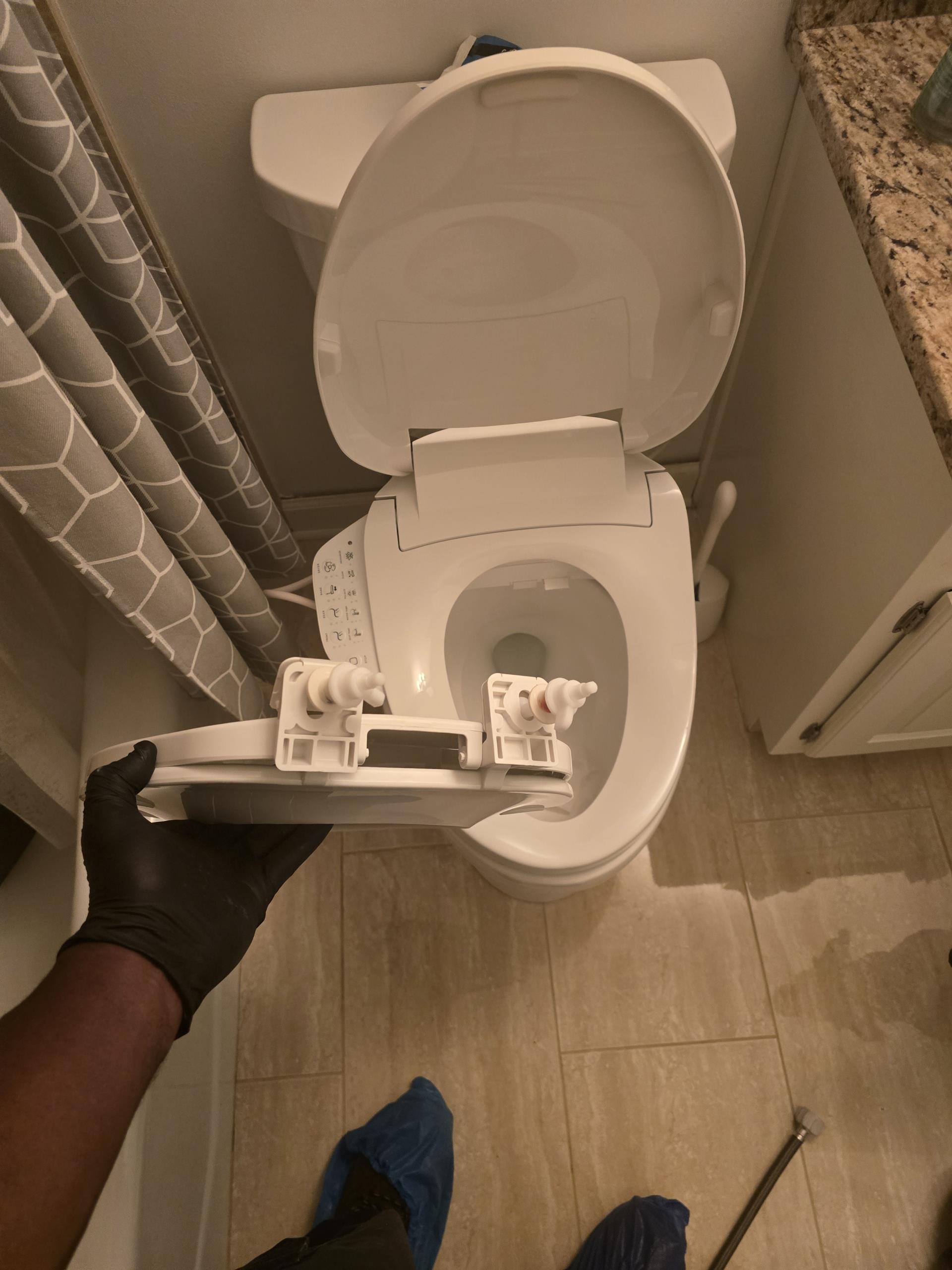 I successfully installed a Kohler electric bidet seat provided by the customer. The procedure began with shutting off the water supply entirely. I then removed the old seat and installed a specialized T-valve to ensure a secure water connection. The new bidet seat was integrated with the existing GFCI outlet. I conducted a thorough diagnostic on the heated seat, wash functions, and digital controls to confirm everything was working correctly. The system is now fully operational and ready for use.