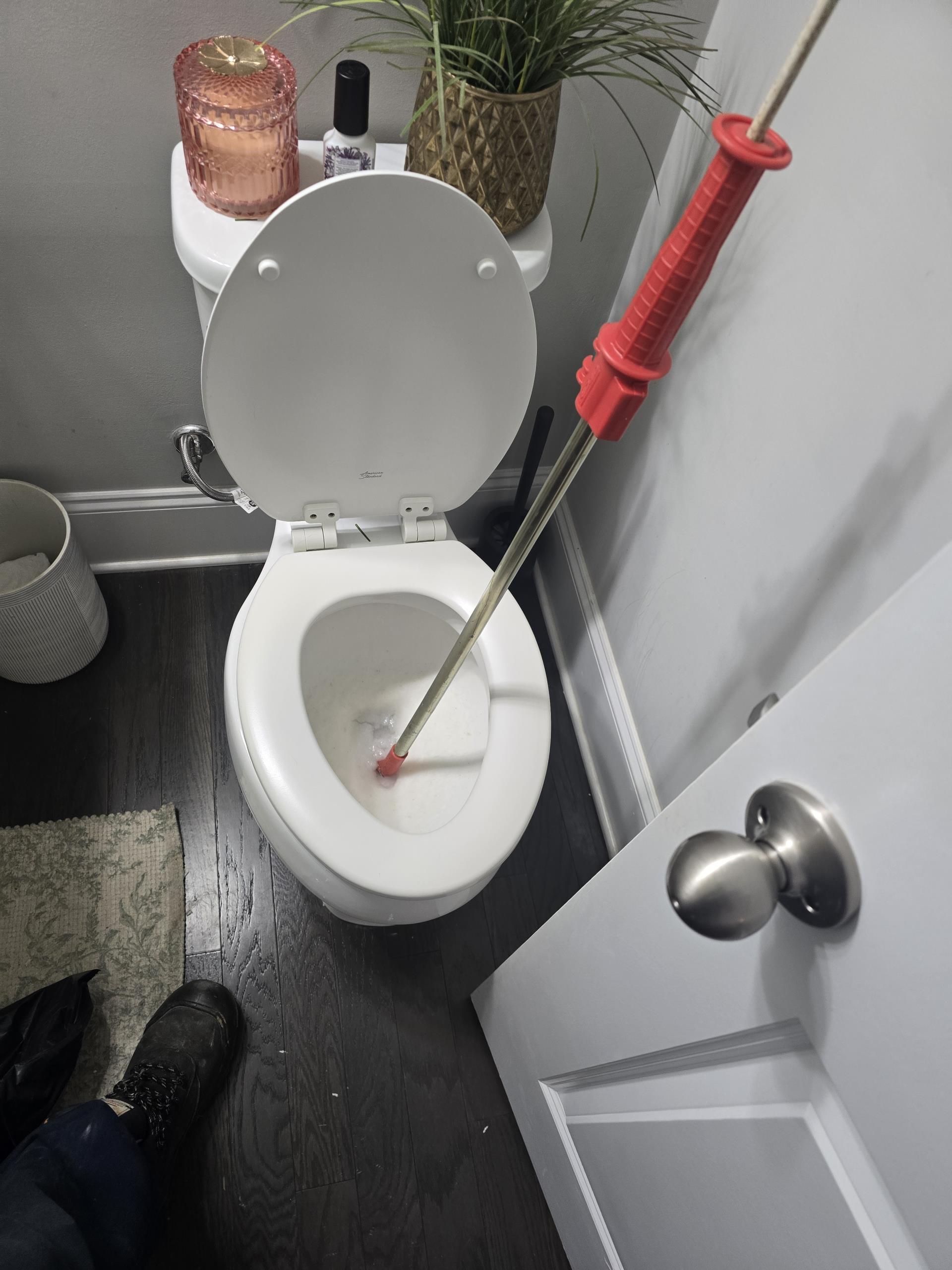 A customer contacted me for assistance with a toilet that was not draining properly. Upon inspection, I identified a blockage in the toilet trap. Using a professional hand auger, I carefully broke up and removed the obstruction, ensuring the porcelain remained undamaged. I restored proper flow and flushed multiple times to confirm everything was functioning correctly. Additionally, I checked for any deeper issues in the line but found none at this time. I turned the water back on and conducted thorough testing. The toilet is now draining properly with no leaks, fully operational and free of issues.