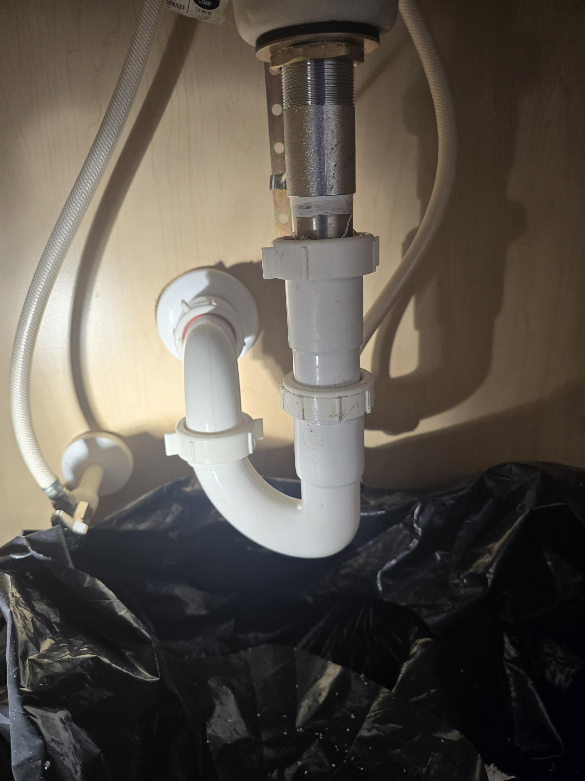 Our team successfully addressed a leaking basement vanity sink by identifying an improperly sized tailpiece that was preventing a secure connection to the P-trap. We meticulously removed the existing drain components, installed a new extension tailpiece to ensure a proper fit, and reassembled the P-trap. After confirming the integrity of the connections, we tested the system to ensure it operated correctly. The sink now drains efficiently without any leaks. Our comprehensive services include professional sink drain repairs, P-trap replacements, leak detection, and ongoing plumbing maintenance.