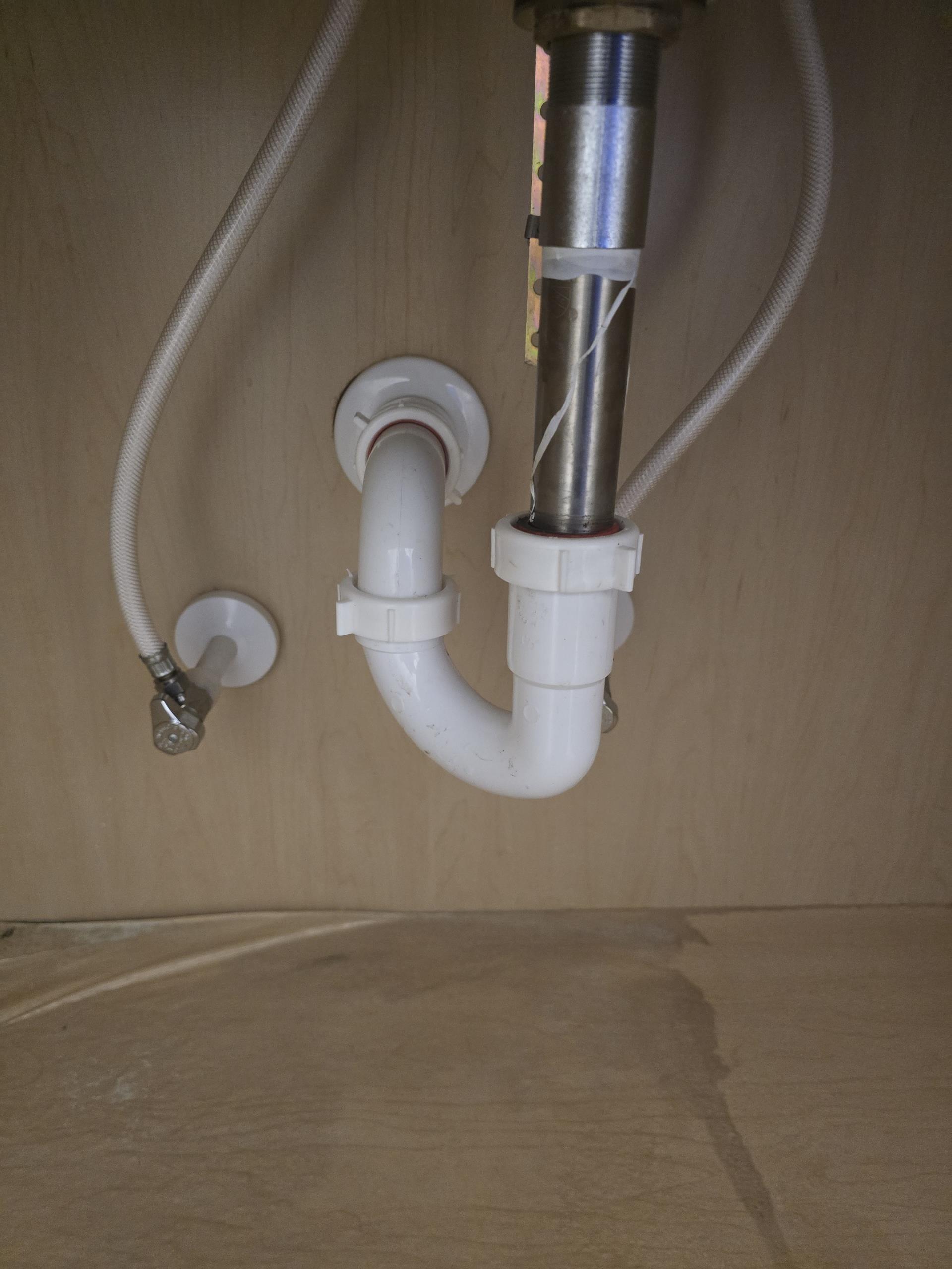 Our team successfully addressed a leaking basement vanity sink by identifying an improperly sized tailpiece that was preventing a secure connection to the P-trap. We meticulously removed the existing drain components, installed a new extension tailpiece to ensure a proper fit, and reassembled the P-trap. After confirming the integrity of the connections, we tested the system to ensure it operated correctly. The sink now drains efficiently without any leaks. Our comprehensive services include professional sink drain repairs, P-trap replacements, leak detection, and ongoing plumbing maintenance.