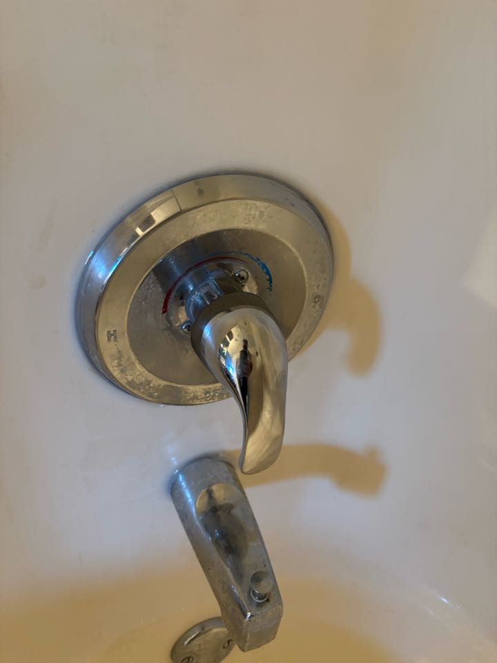 Repair an older Moen shower valve with new internal components to stop it from leaking into the ceiling below.