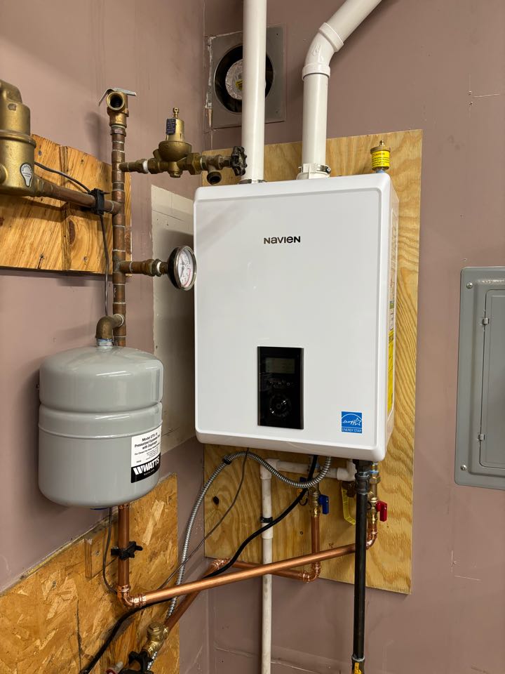 Replace a failing boiler system for radiant heat in a garage. Install new high-efficiency equipment to improve the quality of performance.