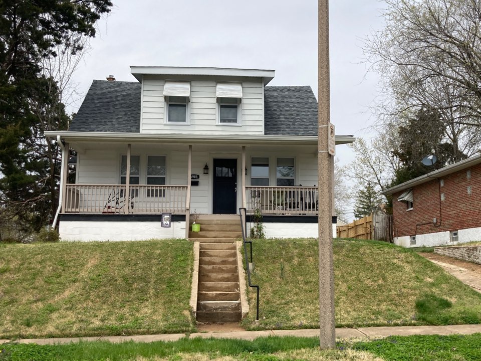St. Louis, MO - EBS is installing new vinyl siding on the dormers and tuck pointing the chimney on this house. St. Louis, MO - EBS is installing new vinyl siding on the dormers and tuck pointing the chimney on this house.
