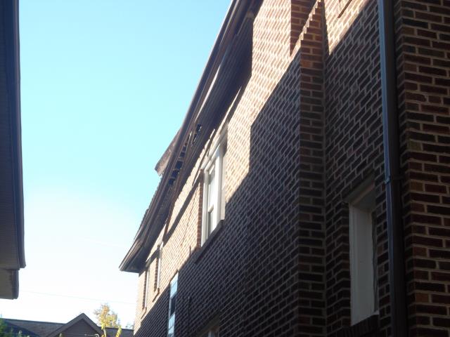 University City, MO - Removing old gutter and soffit that is hanging down and installing new aluminum soffit material and wrapping fascia in aluminum. Then installing new 6" gutter to allow proper drainage of rain. University City, MO - Removing old gutter and soffit that is hanging down and installing new aluminum soffit material and wrapping fascia in aluminum. Then installing new 6" gutter to allow proper drainage of rain.