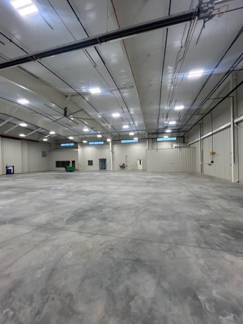 Auburn, AL - Sealed Concrete - Grind and Seal for a hanger before and after pictures