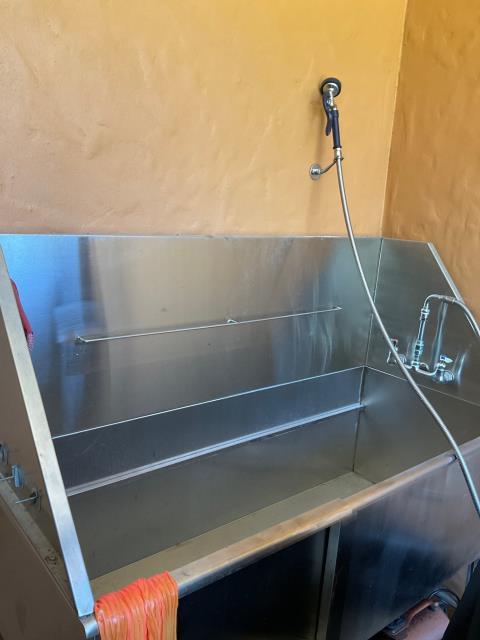 Remove the pet tub cap the water lines and the drain line and move the pet tub. Remove the pet tub cap the water lines and the drain line and move the pet tub.