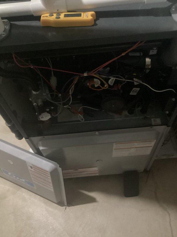 Performed annual furnace maintenance as part of Air Care Membership program. Inspected gas burner assembly and flame sensors, confirming proper operation with blue flame indicators. Checked all electrical connections and control components, with diagnostic testing showing system operating within normal parameters.