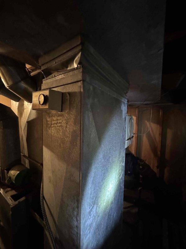 Conducted comprehensive evaluation of 30+ year old natural gas furnace system located in basement. Existing unit is functional but at end of service life expectancy. Documented current installation configuration including ductwork, ventilation lines, and electrical connections to prepare replacement estimate for modern high-efficiency system. Customer has received competing quote and is considering options for complete HVAC replacement.