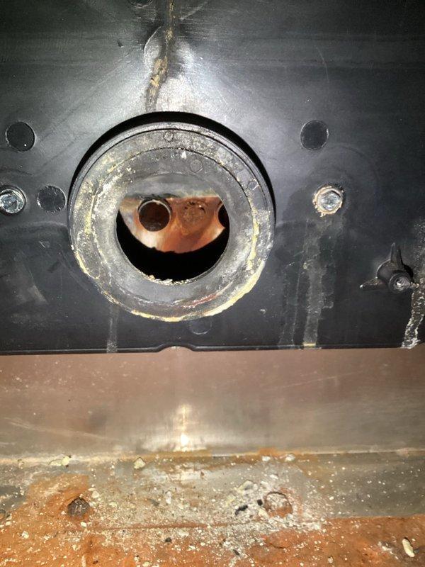 Performed diagnostic inspection on 23+ year old furnace that was not turning on. Discovered significant deterioration of heat exchanger with visible cracking around circular opening and copper components showing signs of wear. Documented system condition with photos showing metal fatigue, corrosion buildup, and potential safety hazards requiring complete assessment for veteran assistance program consideration.