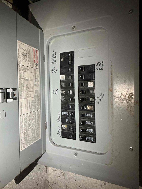 Performed comprehensive evaluation of 10-15 year old natural gas forced air system located in basement. Inspected electrical panel for proper capacity to support replacement system. Assessed existing ductwork configuration and connection points, noting current installation includes galvanized steel ducting with hot/cold water lines featuring color-coded connectors. Prepared estimate for complete furnace and air conditioning replacement.