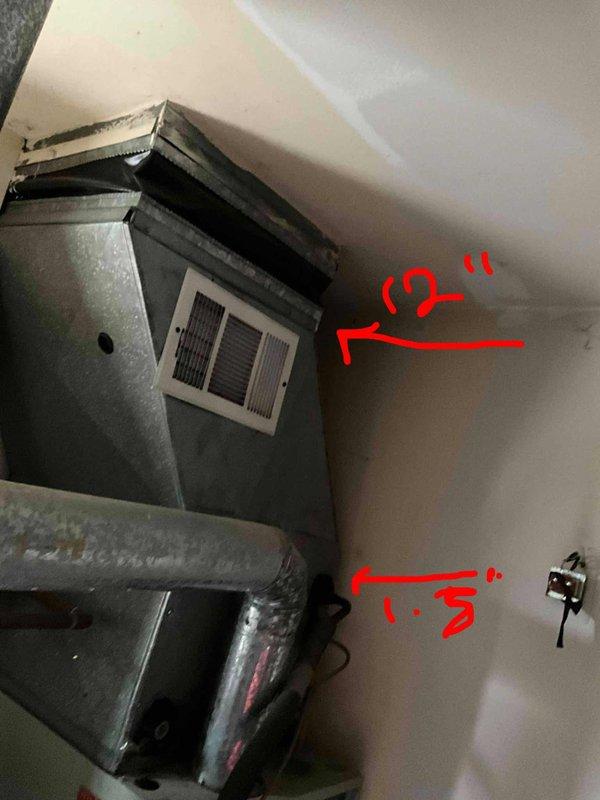 Conducted a full system estimate on a non-operational 1989 furnace. Inspection revealed an aging air handler installed in a confined space with standard galvanized ductwork connections and copper refrigerant lines. Customer requires immediate replacement of the complete HVAC system.