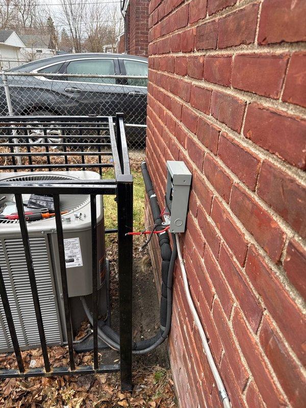 Responded to call back for newly installed 2-ton AC unit to address code violations. Corrected obstruction preventing AC disconnect from opening the required 90 degrees per NEC 110.26(a)(4)(3) and resolved issue with nearby GFCI receptacle that was continuously tripping, ensuring proper function according to manufacturer specifications as required by NEC 110.3(B).