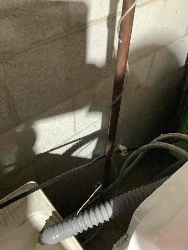 Conducted site assessment for whole-home standby generator installation at existing customer's residence. Evaluated electrical service panel (approximately 20 circuits) and existing mechanical infrastructure including gas line access. Photos documented current panel configuration and utility connections to determine appropriate generator sizing and installation requirements.