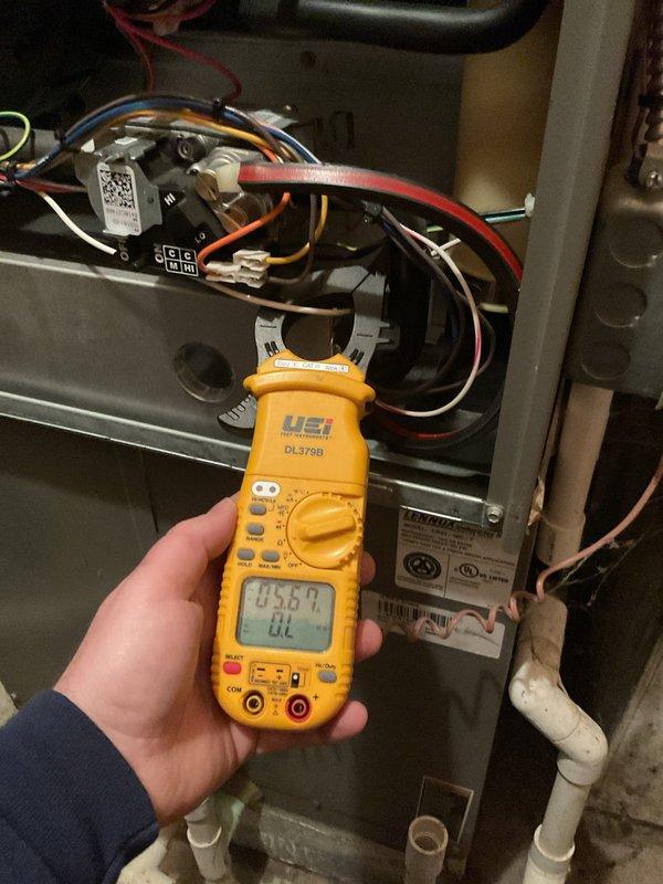 Performed annual furnace maintenance as requested for a 0-year-old unit with CM 2025. Conducted comprehensive electrical testing using UEi DL379B clamp meter to verify proper amperage readings (0.56A) and inspected internal components with specialized tools to ensure optimal system functionality. All diagnostics confirmed unit is operating within manufacturer specifications.