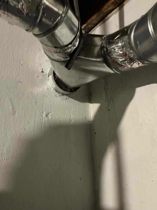 Conducted assessment of 20+ year old non-functional Goodman AC system located in customer's basement. Inspected existing ductwork, electrical panel, and ventilation components, documenting current installation with photos. Customer is considering immediate replacement options within the next few weeks and has expressed interest in current promotional offerings as a RAC member.