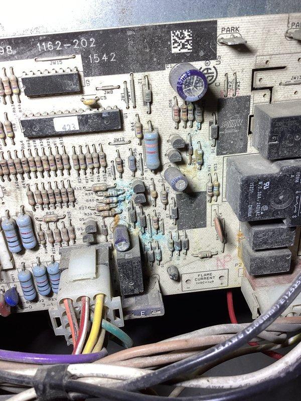 Diagnosed 10-year-old inoperative furnace following power outage. Inspection revealed failed control board with visible burn marks and component damage. Recommended full system replacement due to age of unit and extensive control board failure that would not be cost-effective to repair.