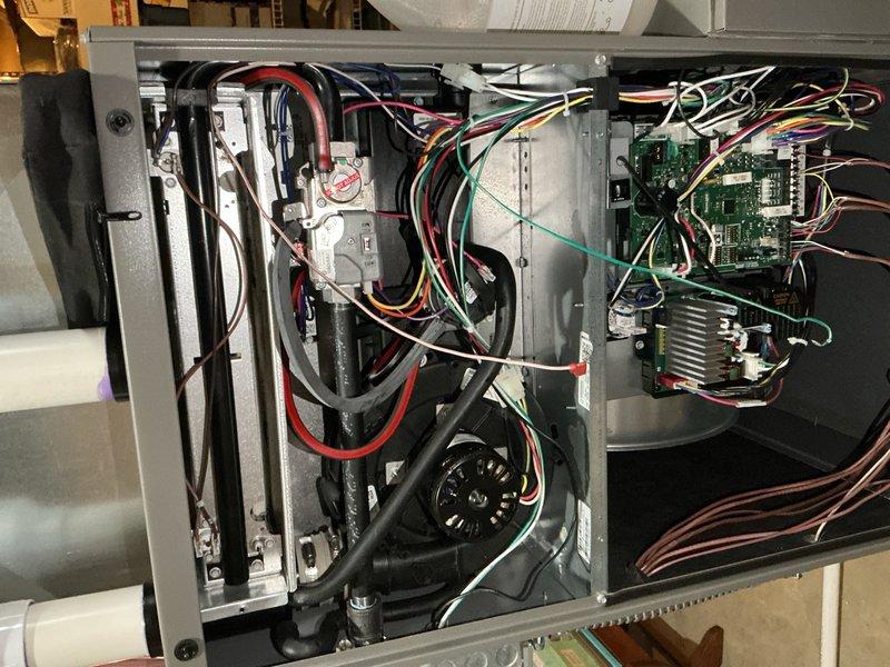 Performed annual furnace maintenance including inspection of control board, wiring connections, and ductwork integrity. Verified system operation and addressed intermittent communication loss issue by cleaning electrical contacts and securing loose connections on the control module. System now functioning properly with all components tested and verified operational.