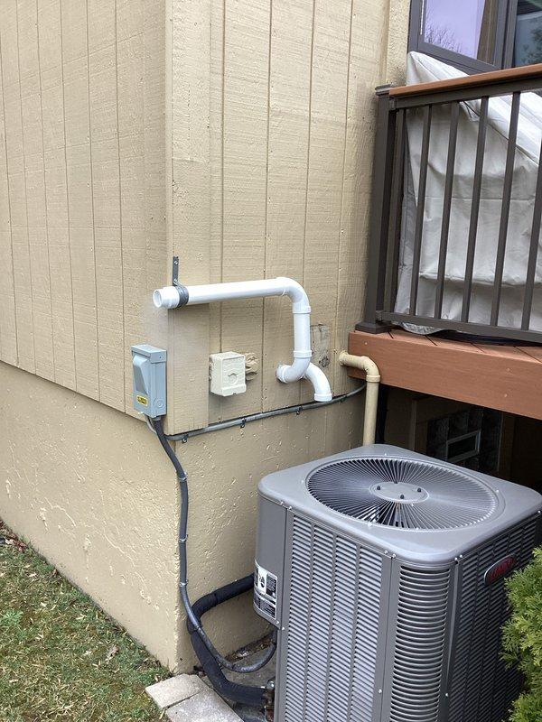 Installed a 70,000 BTU Lennox furnace with integrated humidifier system. Complete installation included proper venting with PVC pipe configuration, electrical connections, and condensate drainage setup. Final inspection confirmed proper operation of the new unit with all mechanical permits secured prior to installation.