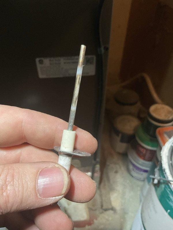 Performed scheduled air handler maintenance and replaced ignition electrode showing signs of wear and discoloration. Inspected and tested all components to ensure proper operation after replacement.