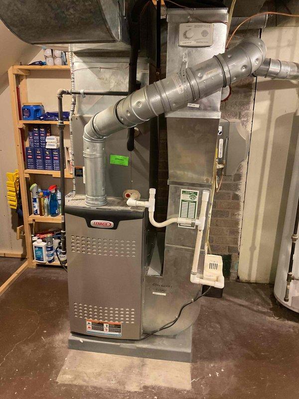 Assessed non-functional natural draft water heater for replacement. Evaluated existing copper plumbing connections and basement installation location. Recommended standard water heater replacement rather than tankless option, with proper venting to connect to existing system.