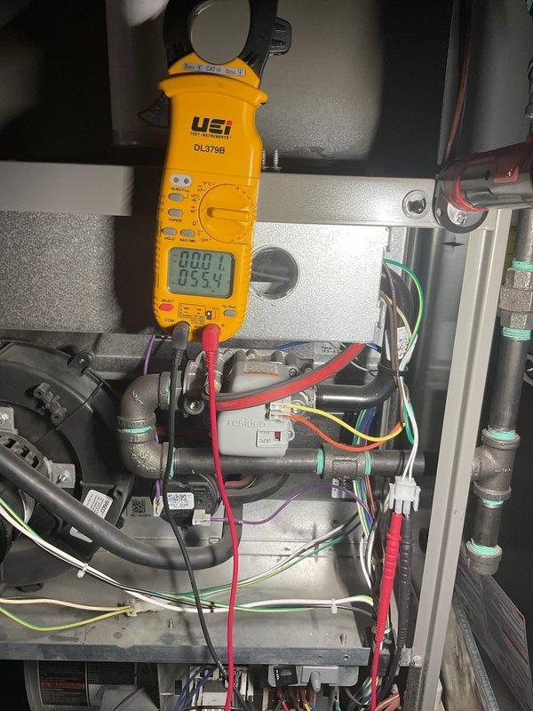 Performed annual preventative maintenance on furnace per membership agreement. Conducted electrical measurements with clamp meter, verifying voltage (85.9V) and amperage (0.4A) readings on system components. All diagnostics indicate equipment is operating within normal parameters.