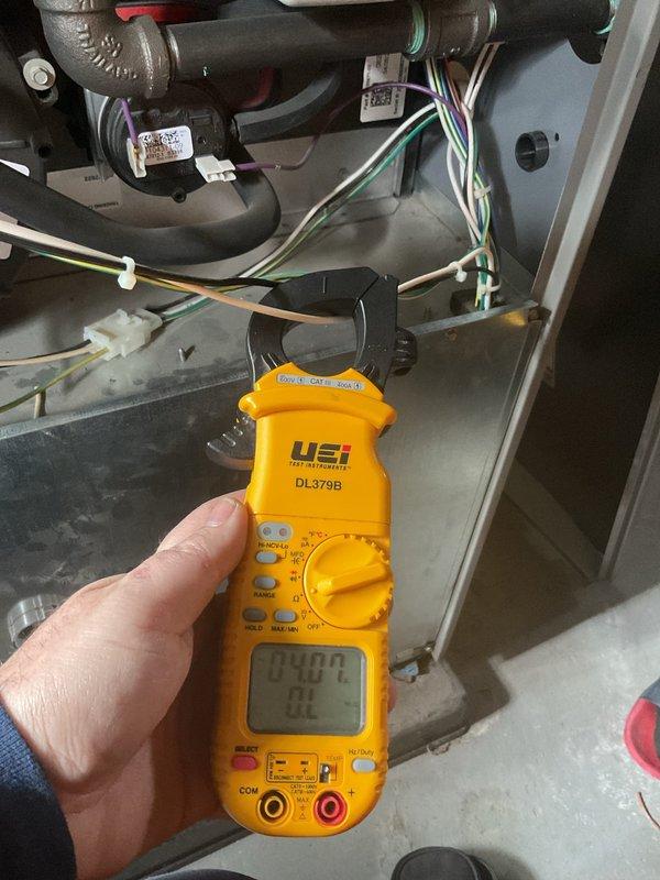 Performed annual preventative maintenance on furnace per membership agreement. Conducted electrical measurements with clamp meter, verifying voltage (85.9V) and amperage (0.4A) readings on system components. All diagnostics indicate equipment is operating within normal parameters.