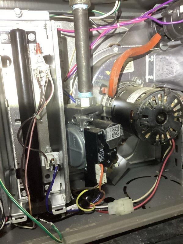 Performed scheduled air handler maintenance service. Inspected internal components including motor, fan assembly, control unit, and electrical connections. All systems were found to be properly assembled and in working condition with no visible damage or deterioration to components.