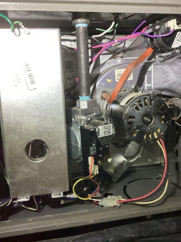 Performed scheduled air handler maintenance service. Inspected internal components including motor, fan assembly, control unit, and electrical connections. All systems were found to be properly assembled and in working condition with no visible damage or deterioration to components.
