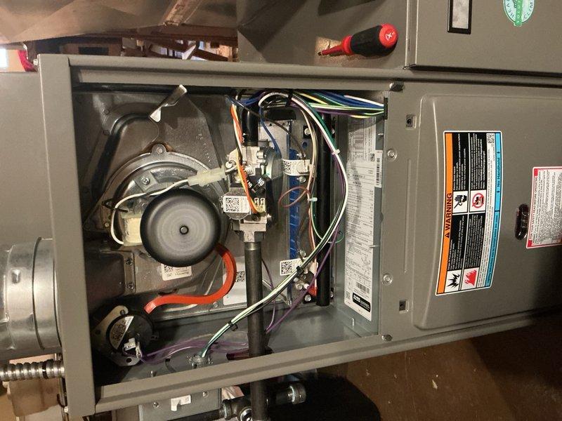 Performed annual furnace maintenance on a functioning 0-year-old unit as scheduled. Completed comprehensive inspection of blower motor assembly, electrical components, and control boards with all wiring connections verified. System tested and confirmed to be operating within manufacturer specifications; no issues identified during the tune-up service.