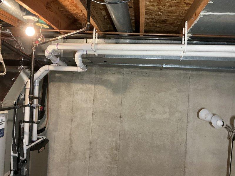 Completed installation of complete HVAC system including 70,000 BTU Goodman furnace and 2.5-ton air conditioning unit. System includes properly sized and installed metal ductwork with insulated connection points, PVC condensate drainage lines, and all necessary electrical connections. Mechanical permits were obtained and all manufacturer specifications were followed for proper system operation.