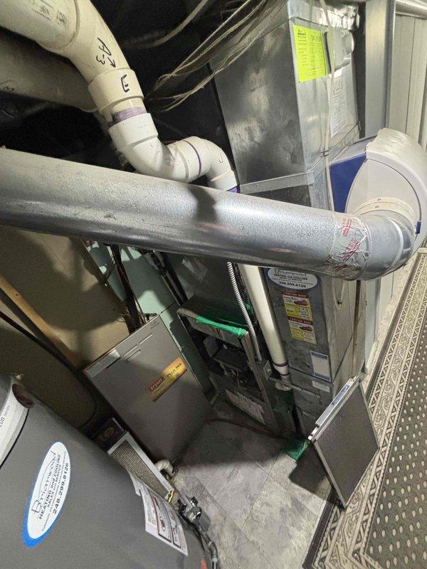 Performed comprehensive evaluation of non-operational 20+ year old HVAC system. Identified need for complete furnace and air conditioning replacement due to system failure and age. Documented existing setup including ductwork configuration, ventilation system, and exterior condenser location for proper replacement specification and installation planning.