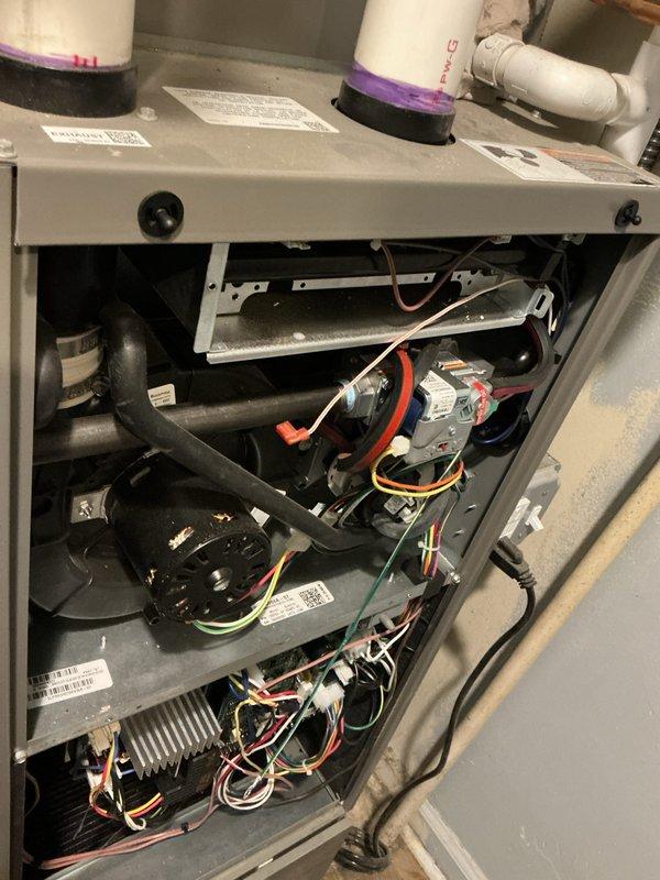 Performed annual maintenance on 10-year-old Lennox furnace system. Checked thermostat functionality (currently set to 68°F with heat threshold at 66°F) and inspected furnace components including blower motor, electrical connections, and PVC intake/exhaust vents. System is operating normally with next maintenance recommended in 2025.