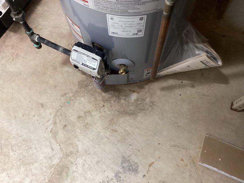 Performed diagnostic assessment on Lochinvar tanked water heater (installed January 2020) in mechanical room. Inspected all connections, including copper and PVC piping, and evaluated unit's operational status. No active leaks observed despite minor historical staining around base; system currently functioning within normal parameters.