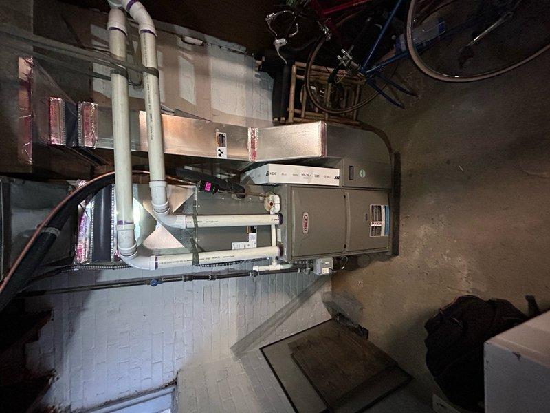 Responded to service call for 2023 furnace not reaching set temperature (stuck at 56 degrees). Performed diagnostic assessment on high-efficiency system with PVC ventilation and verified proper operation of all components. Unit was restored to normal function under existing parts and labor warranty with no issues found requiring replacement parts.