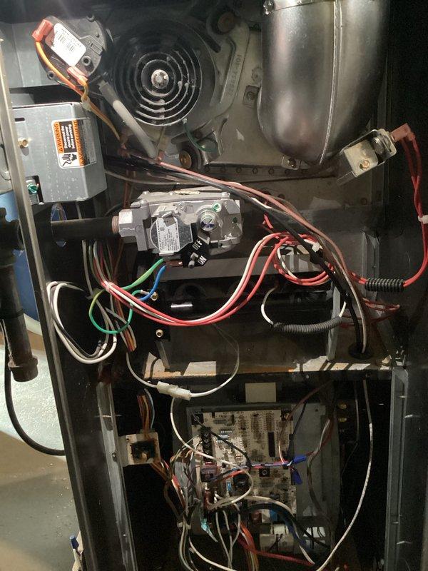 Performed annual furnace maintenance under active Air Care Membership. Discovered severely clogged filter with extensive dust buildup causing restricted airflow and reduced system efficiency. Replaced filter, inspected internal components including blower assembly, gas valve, and circuit board connections, and completed standard tune-up procedures to restore proper system operation.