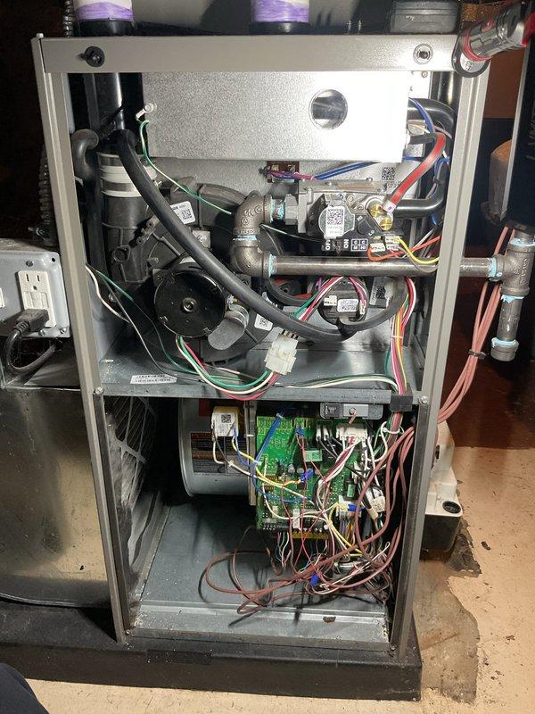 Completed ComfortGuard Maintenance Package service on HVAC system, performing comprehensive electrical diagnostics with UEi DL379B clamp meter to verify proper voltage and current readings. Conducted thorough inspection of internal components including blower motor assembly, circuit board connections, and wiring harness, confirming all systems are operating within normal parameters.