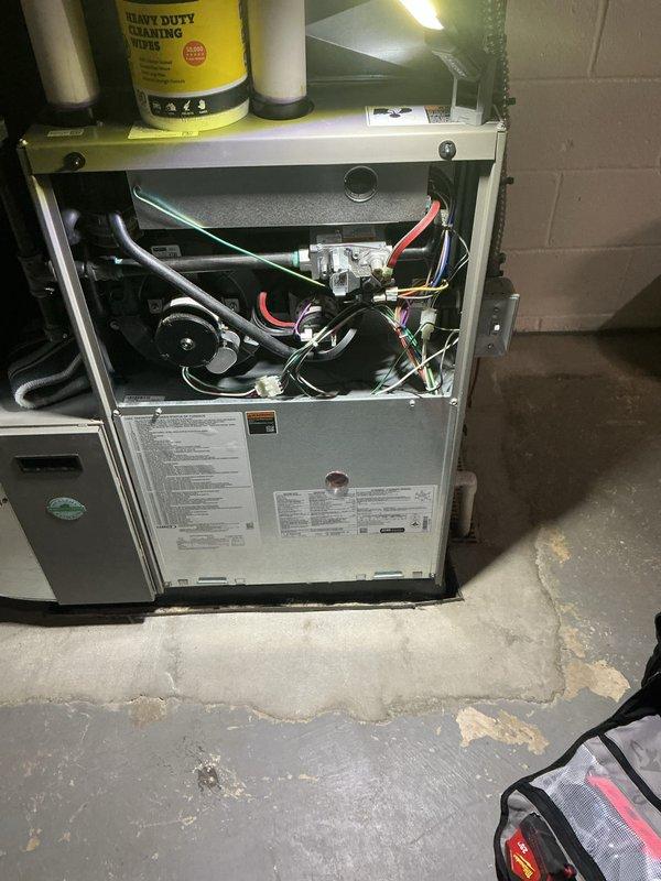 Conducted annual heating maintenance on customer's furnace as part of their Air Care Membership. Performed comprehensive inspection with front panel removed, examining all critical components including blower motor, wiring harnesses, gas valves, and control boards. System is functioning properly with no issues identified; all maintenance completed according to manufacturer specifications.