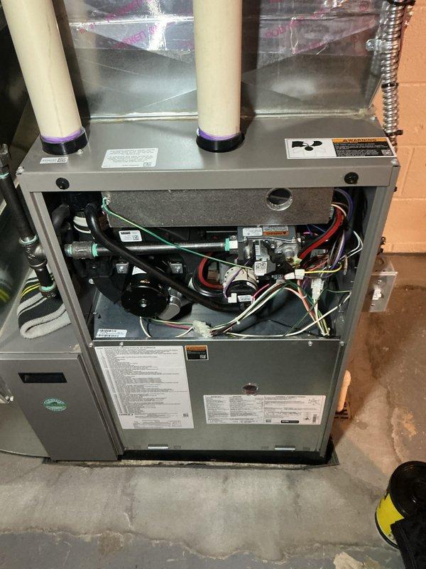 Conducted annual heating maintenance on customer's furnace as part of their Air Care Membership. Performed comprehensive inspection with front panel removed, examining all critical components including blower motor, wiring harnesses, gas valves, and control boards. System is functioning properly with no issues identified; all maintenance completed according to manufacturer specifications.