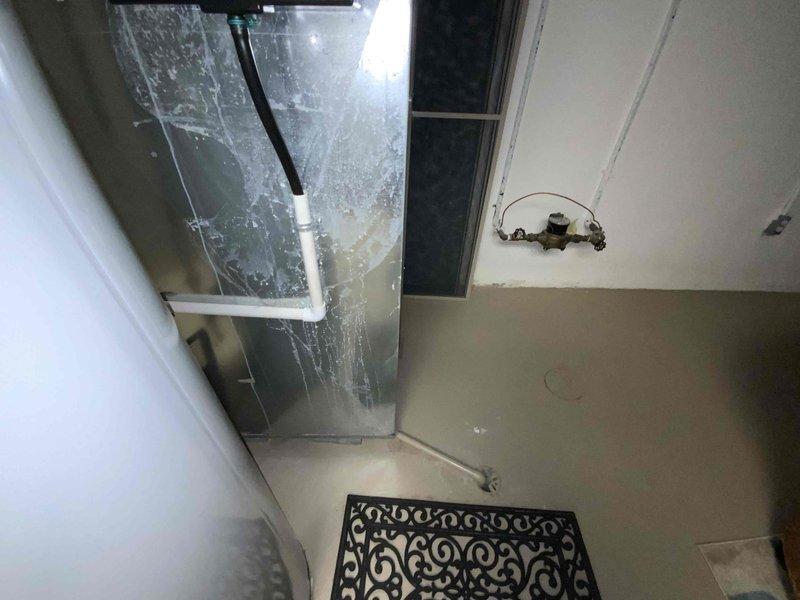 Conducted an estimate for replacement of a 20-year-old furnace and A/C system located in the basement. Visual inspection revealed an operational gas burner assembly with proper blue flame pattern indicating complete combustion, though the age of the equipment warrants replacement. Noted water damage and possible mold in adjacent utility area that may require remediation during installation of new system.