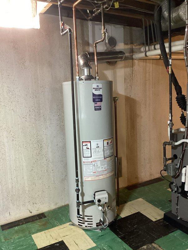 Successfully installed a 40-gallon tanked water heater in customer's basement. Completed all necessary connections to existing copper plumbing, ensuring proper venting and control system functionality. The ICON System controller was verified operational with all safety features tested.
