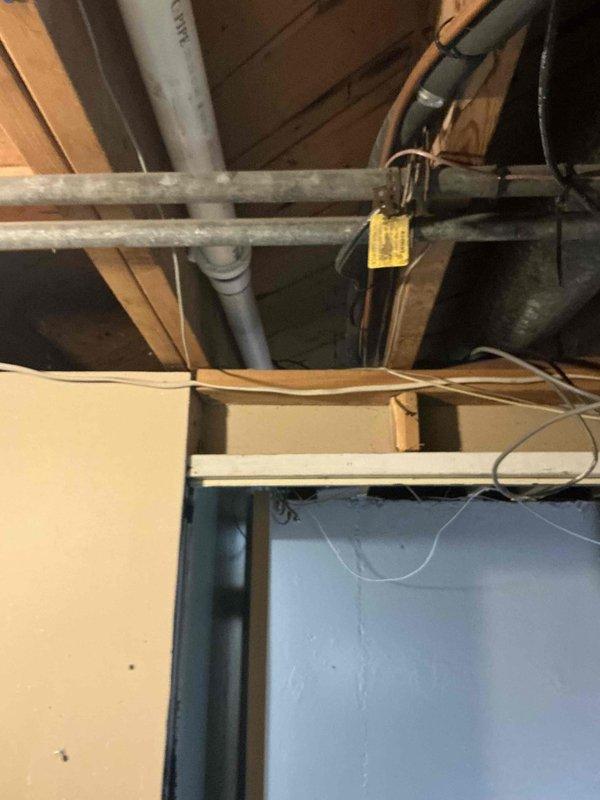 Completed inspection of 16-year-old Trane XR14 AC system for replacement estimate. Evaluated existing installation including furnace/air handler, refrigerant line set, condensate pump, and associated PVC drainage components. Documented current configuration in unfinished basement area with photos to develop appropriate replacement solution for customer who requires system replacement within the next few weeks.