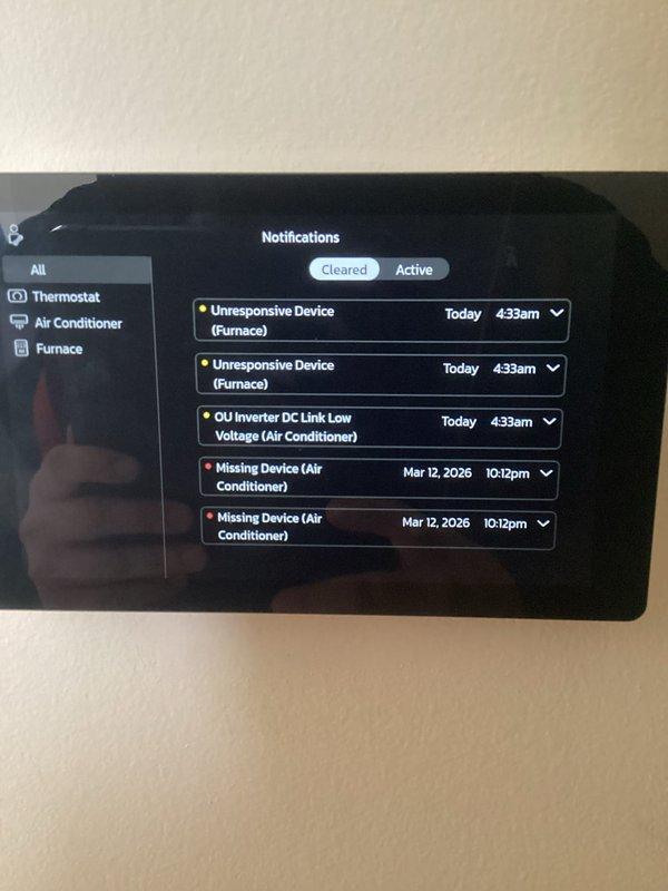Responded to error code 163 (refrigerant detection control) on recently installed system. Inspected thermostat displaying multiple notifications including "Unresponsive Device (Furnace)" and "OU Inverter DC Link Low Voltage (Air Conditioner)" errors. Verified refrigerant lines and connections were properly installed and secured with no detectable leaks.