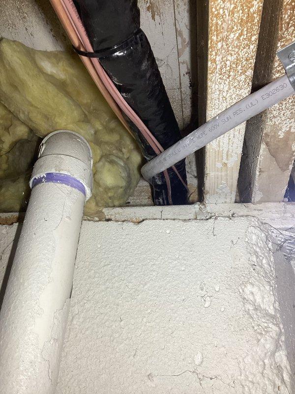 Responded to error code 163 (refrigerant detection control) on recently installed system. Inspected thermostat displaying multiple notifications including "Unresponsive Device (Furnace)" and "OU Inverter DC Link Low Voltage (Air Conditioner)" errors. Verified refrigerant lines and connections were properly installed and secured with no detectable leaks.