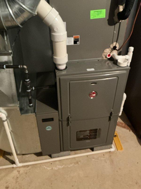 Performed annual preventative maintenance on 2-year-old Rheem forced air furnace system. Completed comprehensive tune-up including inspection of all components, venting, and connections. System is operating properly with no issues identified; customer's complimentary maintenance service completed successfully.