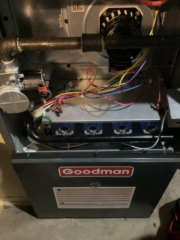 Performed annual preventative maintenance on Goodman furnace under Air Care Membership program. Inspected all internal components including electrical connections, blower assembly, and ventilation system. Unit is functioning normally with no issues identified; all wiring connections are secure and properly color-coded per manufacturer specifications.