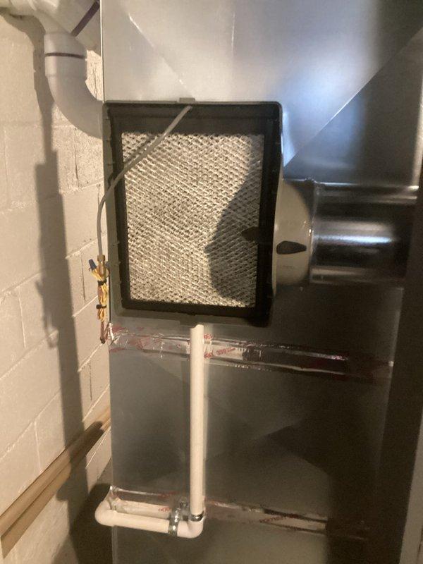 Performed annual heating maintenance on furnace system per Air Care Membership. Inspected HVAC unit and associated PVC ventilation/drainage components for code compliance as requested. Verified proper operation of condensate pump system and confirmed no immediate violations were present in the installation.
