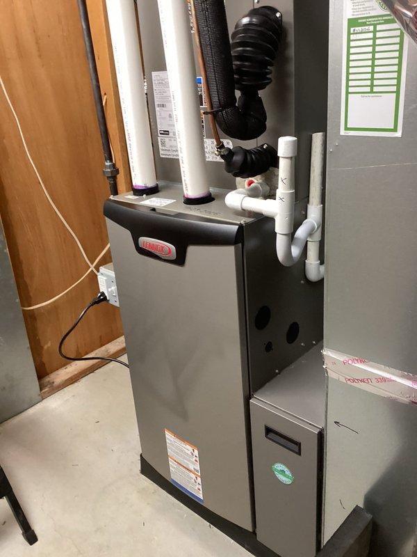 Completed annual heating maintenance on Lennox furnace as part of customer's maintenance membership. Performed comprehensive system inspection and tune-up, including examination of electrical components, blower motor, and ventilation system. All components found to be in proper working condition with no issues identified; system is operating efficiently with clean connections and properly configured drainage.